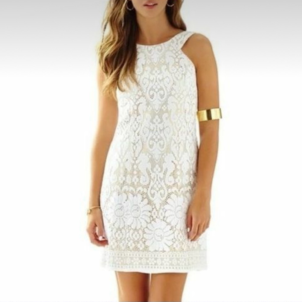 Beautiful Lilly crochet style dress with gold underlay.